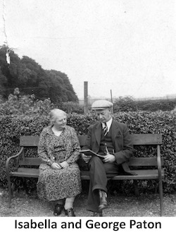 George and Bella Paton sitting in a garden