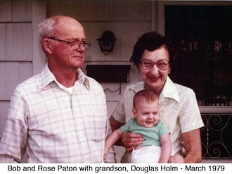 Bob and Rose Paton; Rose holds smiling grandson, Douglas Holm