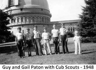 Guy and Gail with five other Cub Scouts lined up in front of 
               dome for the 40-inch telescope at Yerkes Observatory in 1948