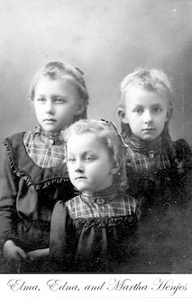 A studio portrait of Elma, Edna, and Martha Henjes