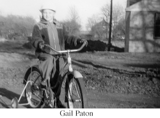 Gail Paton on her bike with training wheels in 1950