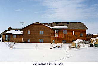 Guy Paton’s home seen on a winter day in 1992 with a clear blue sky
