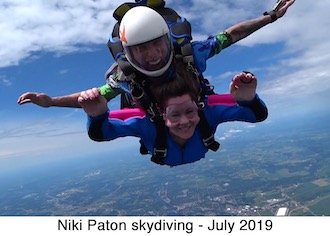 Niki Paton in a tandem sky dive with the ground far below