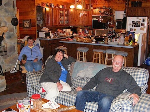 Maija, Looly and Bob 
           relax in front of the kitchen