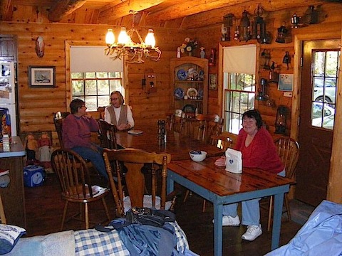 Maija, Ann, and Lolly sit at the table