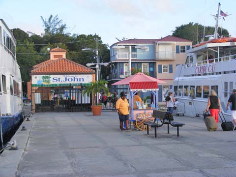 The ferry dock at Cruz Bay, St. John, VI with a woman vendor on Jan 21, 2010